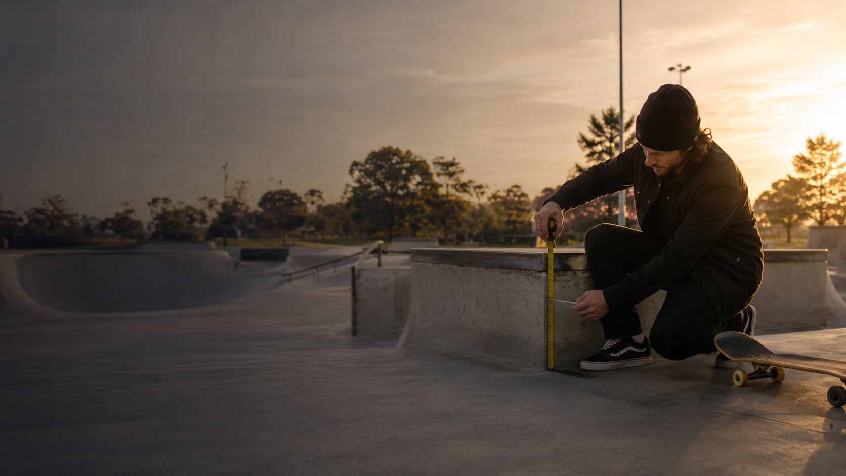 Skateboarder testing skatepark ramp during AS EN 14974:2021 compliance audit